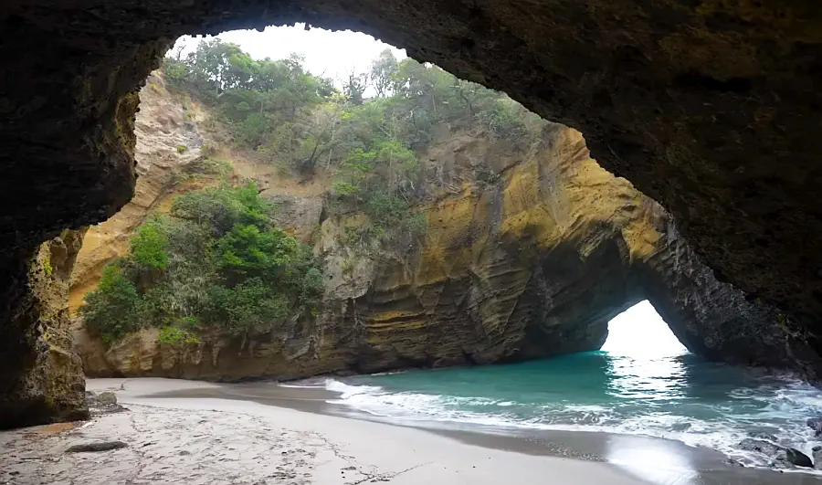 Inside Ryugu Sea Cave looking out to the turquoise sea