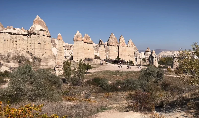 Horseback riding through the rocky valleys of Cappadocia