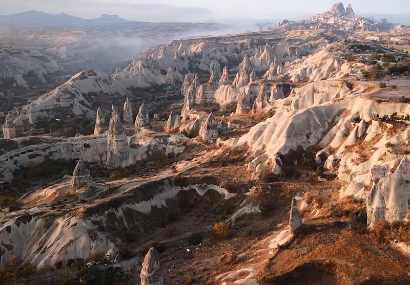 Horseback riding through the rocky valleys of Cappadocia
